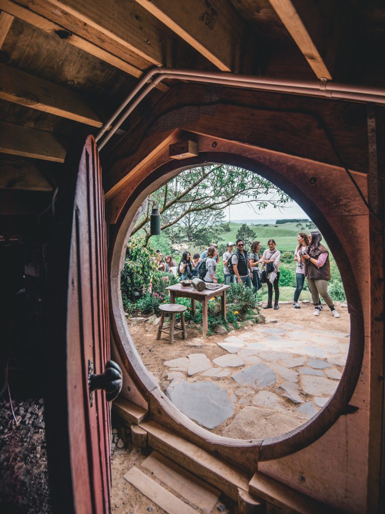 view from inside a hobbit hole in hobbiton movie set